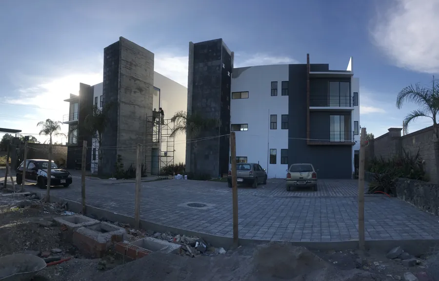 Render de edificio residencial de día — render de anteproyecto arquitectónico de Prisma Habita, Puebla